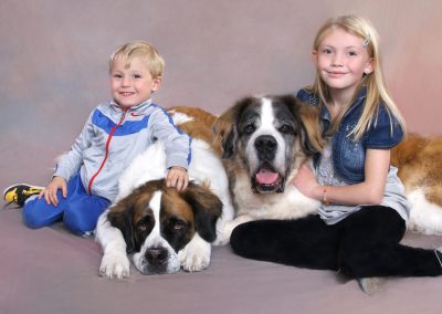 Kids and their Pet dog Saint Bernard